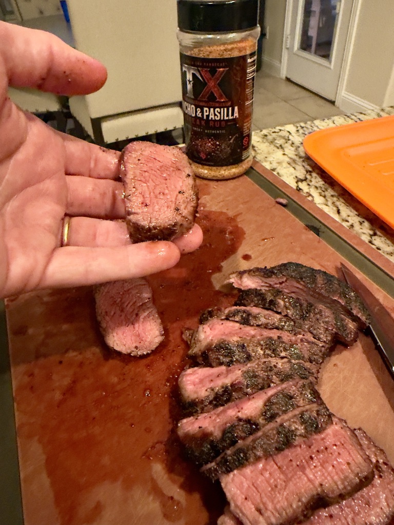 Ty's sliced steak beside Ancho & Pasilla